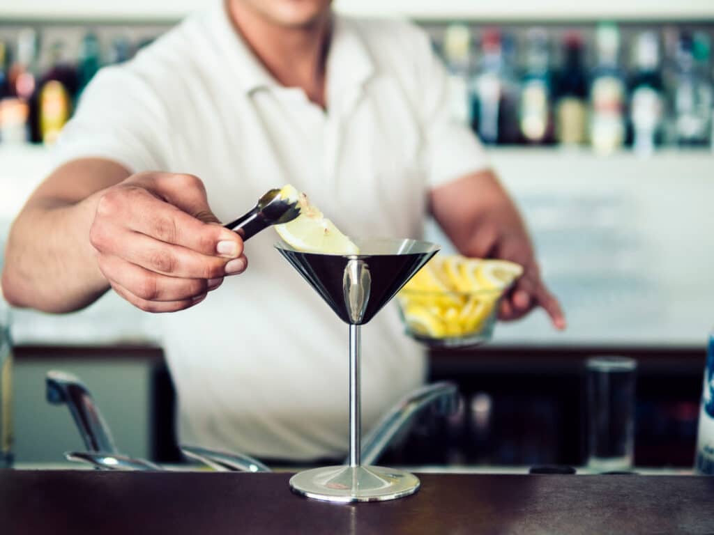 Bartender making a martini cocktail