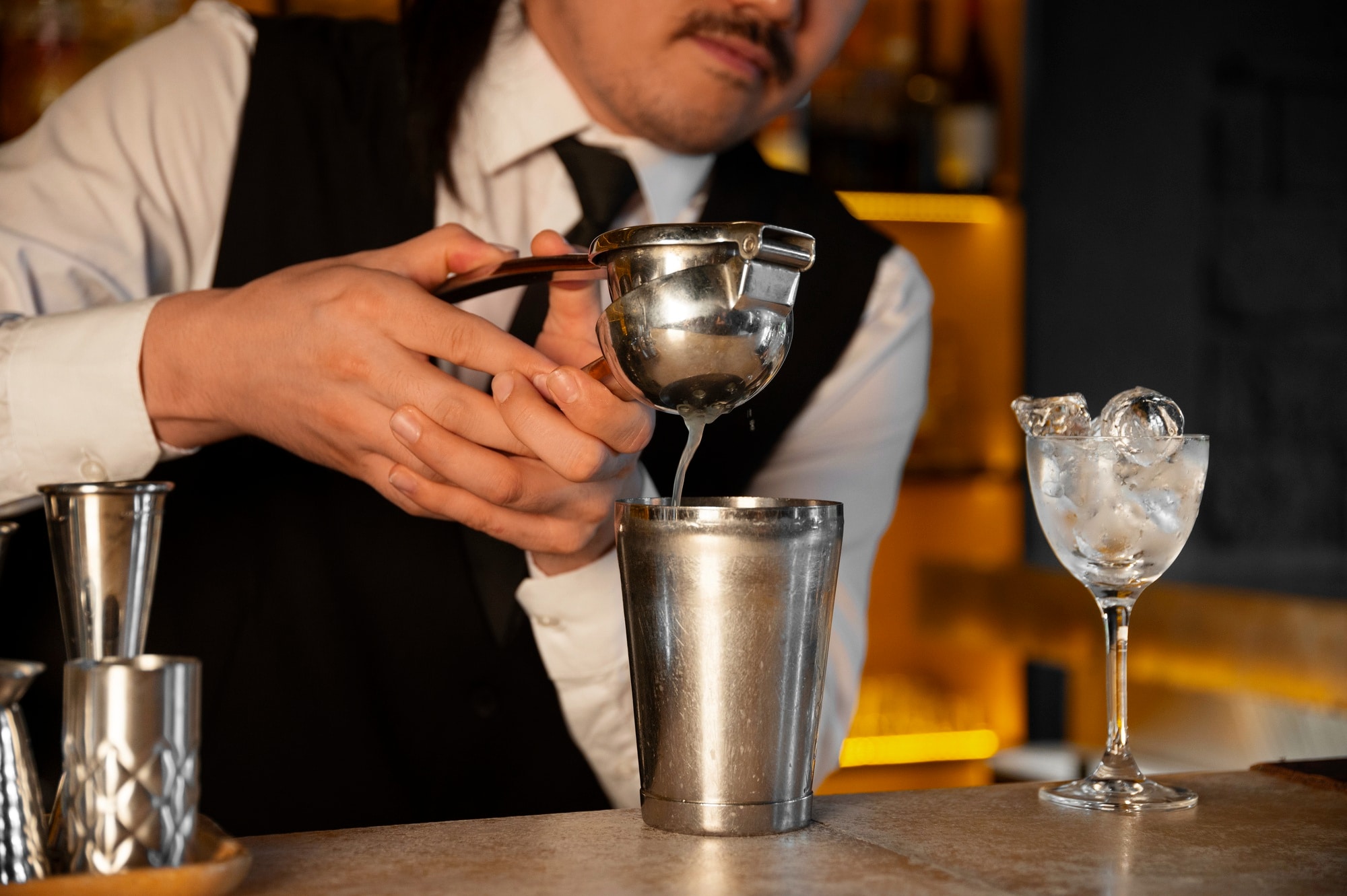 bartender preparing a cocktail