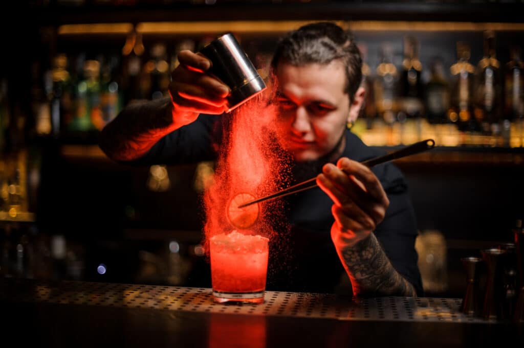 mixologist making a cocktail